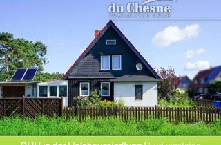 Doppelhaushälfte kaufen in 14974 Ludwigsfelde, Charmante Doppelhaushälfte in der historischen Holzhaussiedlung