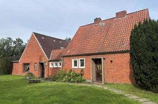 Haus kaufen in 26452 Sande, Zweifamilienhaus mit Nähe zum Kanal in Dykhausen