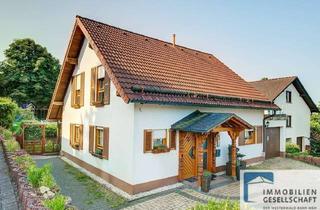 Einfamilienhaus kaufen in 57587 Birken-Honigsessen, Ansprechendes und vermietetes Einfamilienhaus mit hübsch angelegtem Gartengrundstück und Garage!