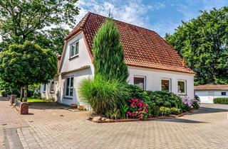 Haus kaufen in 27321 Emtinghausen, Attraktives Dreiparteienhaus mit zusätzlichem Baugrundstück – vielseitige Investitionsmöglichkeit