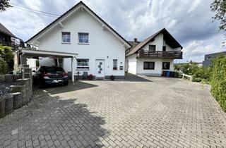 Haus kaufen in 56276 Großmaischeid, zwei Einfamilienhäuser auf großem Grundstück in zentraler Ortslage