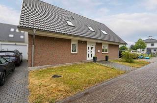 Haus kaufen in 64859 Eppertshausen, Attraktives Zweifamilienhaus im KfW-40-Standard mit großem Garten – ideal für Familien, Eigennutzer
