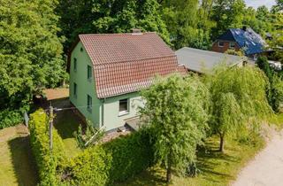 Einfamilienhaus kaufen in 15345 Rehfelde, Einfamilienhaus in Rehfelde - Mit Keller, Lager-/Werkstatt-Nebengebäude, Einbauküche, Balkon uvm.