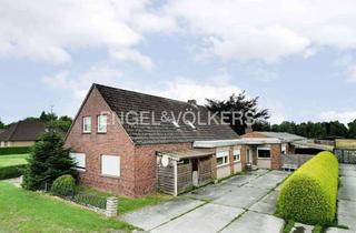 Haus kaufen in 26639 Wiesmoor, Idyllische Kanallage: Mehrparteienhaus mit großem Grundstück