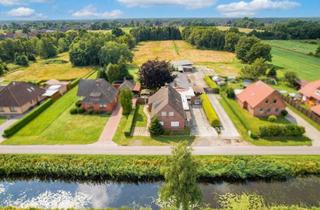 Haus kaufen in 26639 Wiesmoor, Gewerblich nutzbares Anwesen mit Halle, Werkstatt, Pferdeboxen und vier Wohneinheiten