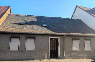 Haus kaufen in 06780 Zörbig, Historisches Reihenmittelhaus mit Potenzial – Sanierungsobjekt in Zörbig