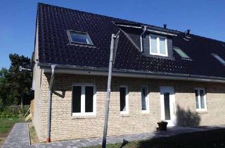 Wohnung kaufen in 25813 Husum, Moderne Eigentumswohnung mit Garten in zentraler Lage von Husum