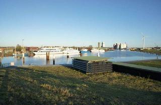 Wohnung kaufen in 25813 Husum, Eigentumswohnung mit Garten in zentraler Lage von Husum