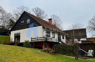 Einfamilienhaus kaufen in 34385 Bad Karlshafen, Bad Karlshafen / Helmarshausen - Natur Pur! Einfamilienhaus mit separater Wohneinheit mit Traum Grundstück & Blick auf die Krukenburg in Bad Karlshafen Helmarshausen