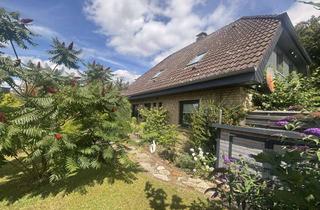 Haus kaufen in 24809 Nübbel, Solides Haus mit 7 Zimmern und Doppelgarage in ruhiger Sackgassenlage