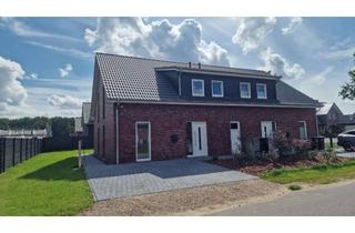Wohnung kaufen in Roggenkamp 2b, 27389 Helvesiek, Rein in das Eigenheim! Neubau Doppelhaushälfte mit Terrasse