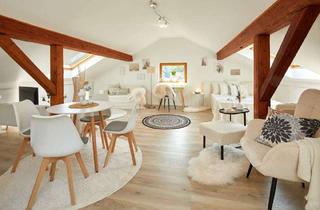 Wohnung kaufen in 63867 Johannesberg, Charmante, helle 1-Zimmer-Dachgeschosswohnung mit Dachloggia und Klimaanlage