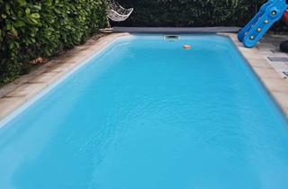 Wohnung kaufen in 77746 Schutterwald, Leben wie im Urlaub. 134 qm Traumwohnung mit Kamin und beheizbarem Pool in Schutterwald.