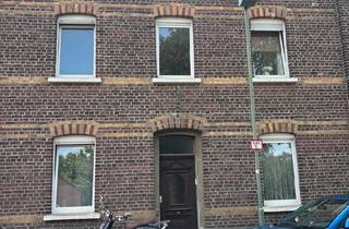 Reihenhaus kaufen in 40670 Meerbusch, Meerbusch - Charmantes Altbau-Reihenhaus mit Potenzial in zentraler Lage
