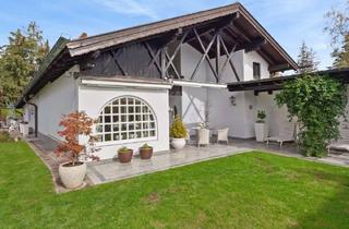 Wohnung kaufen in 82031 Grünwald, "Haus im Haus" - Stilvoller Wohntraum mit privatem Garten