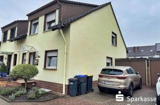 Doppelhaushälfte kaufen in 59192 Bergkamen, Attraktive Doppelhaushälfte mit Garten, Keller und Garage in begehrter Lage