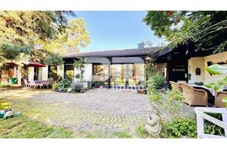 Einfamilienhaus kaufen in 34266 Niestetal, Einfamilienhaus im Bungalow-Stil + Nutzflächen / Pool / Terrasse auf riesigem Traumgrundstück
