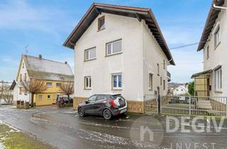 Haus kaufen in 35469 Allendorf, Attraktive Kapitalanlage mit 8 % Rendite! Zweifamilienhaus mit einer vermieteten Partei.
