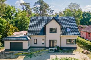 Einfamilienhaus kaufen in 15526 Bad Saarow, Mit Erdwärme, Fußbodenheizung, Einbauküche, Garage, Kamin u.v.m.: Neubau-Einfamilienhaus Bad Saarow