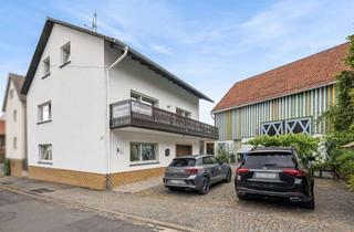 Einfamilienhaus kaufen in 35305 Grünberg, Solides Einfamilienhaus mit tollen Möglichkeiten und großem Nebengebäude in Grünberg!