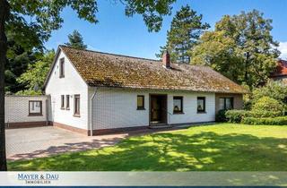 Einfamilienhaus kaufen in 26188 Edewecht, Geräumiges Einfamilienhaus mit Doppelcarport und Garage in grüner Lage, Obj. 8859