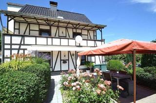 Einfamilienhaus kaufen in Martinstraße 2, 54340 Ensch, Ensch - Familienfreundliches Haus mit Garten, 3 Wohneinheiten, Garagen und Keller Weitblick