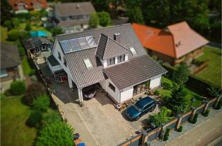 Einfamilienhaus kaufen in 26215 Wiefelstede, Wiefelstede / Ofenerfeld - Wohnen, Leben, Genießen ,großzügiges Haus mit Remise & Outdoorküche