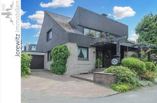 Einfamilienhaus kaufen in 33803 Steinhagen, Steinhagen - Einfamilienhaus mit Einliegerwohnung in Steinhagen - Wohnen nahe dem Naturschutzgebiet