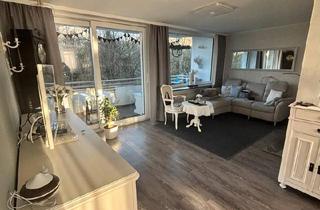 Wohnung kaufen in 36251 Bad Hersfeld, Bad Hersfeld - Traumhafte Eigentumswohnung mit Kamin, Balkon und Garten