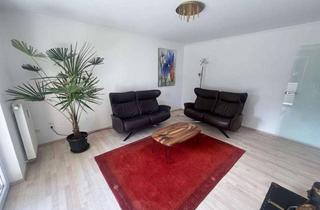 Wohnung kaufen in 85737 Ismaning, Traumwohnung mit Hobbyraum und Gartennutzung