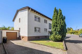 Haus kaufen in 35633 Lahnau, Familien(t)raum mit Garten – Zweifamilienhaus mit vielseitigem Potenzial!