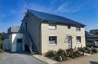 Einfamilienhaus kaufen in 48488 Emsbüren, Einfamilienhaus mit vermieteter Einliegerwohnung