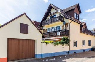 Haus kaufen in 65468 Trebur, Attraktives Zweifamilienhaus mit Gartenparadies und Garage