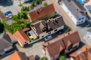 Einfamilienhaus kaufen in 65468 Trebur, Haus nutzbar als Ein- oder Zweifamilienhaus mit großer Garage und schönem kleinen Garten in Astheim