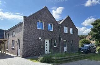 Doppelhaushälfte kaufen in 26689 Apen, Apen / Augustfehn - Wohnen mit Lebensqualität - Doppelhaushälfte in zentraler Lage von Apen