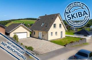 Haus kaufen in 56729 Herresbach, Herresbach - Solides Wohnhaus aus 2005 mit Doppelgarage und Blick ins Grüne in Herresbach, Nähe Nürburgring