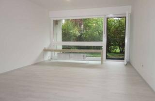 Wohnung kaufen in Am Olympiapark, 80797 Schwabing-West, Charmante, sonnige 2-Zimmer-Terrassenwohnung mit Garten direkt am Olympiapark