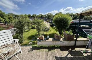 Reihenhaus kaufen in Schröderstraße 26, 44532 Lünen, Saniertes Reihenhaus in der Bergmannssiedlung am Kanal mit großem Garten und PV-Anlage