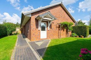 Haus kaufen in 24631 Langwedel, -RESERVIERT- Wohlfühlen auf einer Ebene – moderner Bungalow mit großem Grundstück