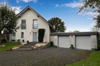 Haus kaufen in 59597 Erwitte, Modern, viel Platz & großzügiges Grundstück:Zweifamilienhaus mit Doppelgarage in Erwitte-Völlinghausen!