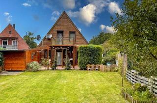 Einfamilienhaus kaufen in 27711 Osterholz-Scharmbeck, Familienidyll mit großem Garten & Werkstatt: Perfekt zum Wohlfühlen