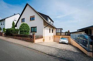 Haus kaufen in 60437 Frankfurt am Main, Frankfurt am Main - Freistehendes Zweifamilienhaus in begehrter, idyllischer Wohnlage