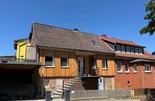 Wohnung kaufen in Im Höxter 26, 31840 Hessisch Oldendorf, Charmantes Einfamilienhaus mit Einliegerwohnung