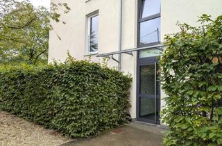 Wohnung kaufen in Hirschlander Straße 27, 71254 Ditzingen, Stilvolle Maisonette mit Privatgarten im Herzen von Ditzingen