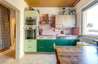Einfamilienhaus kaufen in 63796 Kahl, Charmantes Einfamilienhaus mit vielseitigem Nebengebäude in zentraler Lage von Kahl am Main