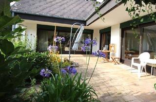 Einfamilienhaus kaufen in 37269 Eschwege, Eschwege - Stilvolles Einfamilienhaus im L-Form, mit Terrasse und parkähnlich angelegtem Garten, in ruhiger Lage