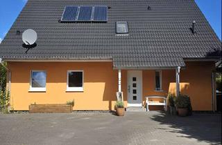 Einfamilienhaus kaufen in 25774 Lehe, Wohlfühloase: Modernes Einfamilienhaus mit Einliegerwohnung, Garten und viel Platz im Grünen!
