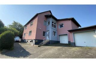 Haus kaufen in Blessenbacher Straße 24, 35796 Weinbach, Zweifamilienhaus mit großem Garten in Ortsrandlage.
