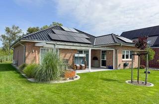 Haus kaufen in 26553 Dornum, RESERVIERT! Wohntraum an der Nordsee! Bungalow in Neßmersiel direkt am Deich.