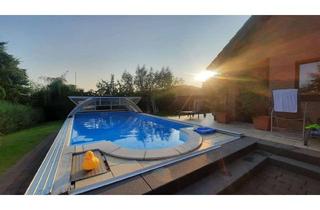 Einfamilienhaus kaufen in 35469 Allendorf, Einfamilienhaus mit Schwimmbad und Sauna